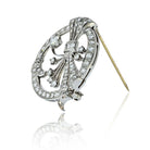 Platinum 4.00cttw Round And Baguette Cut Diamond Brooch - The Back Vault