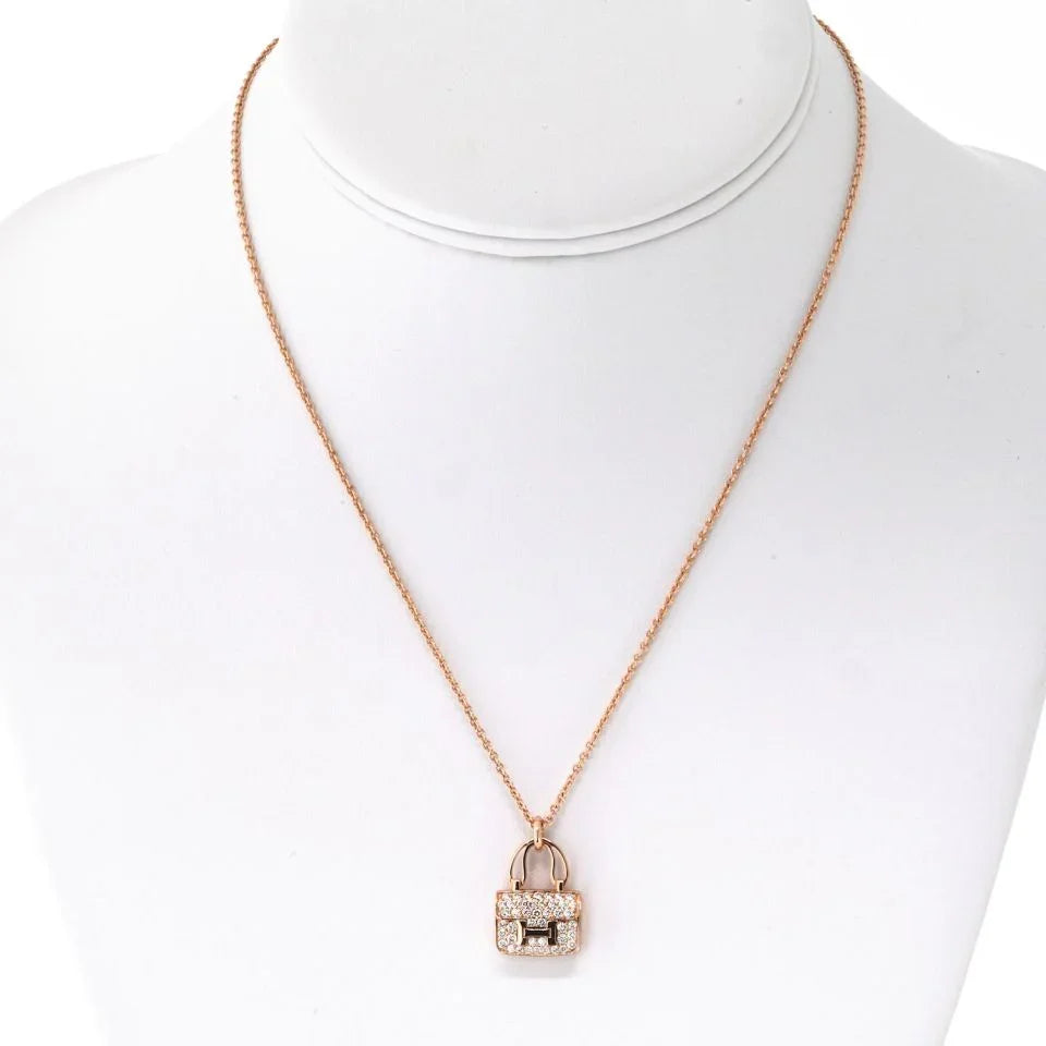Hermes 18K Rose Gold Amulettes Constance Pendant Necklace - The Back Vault