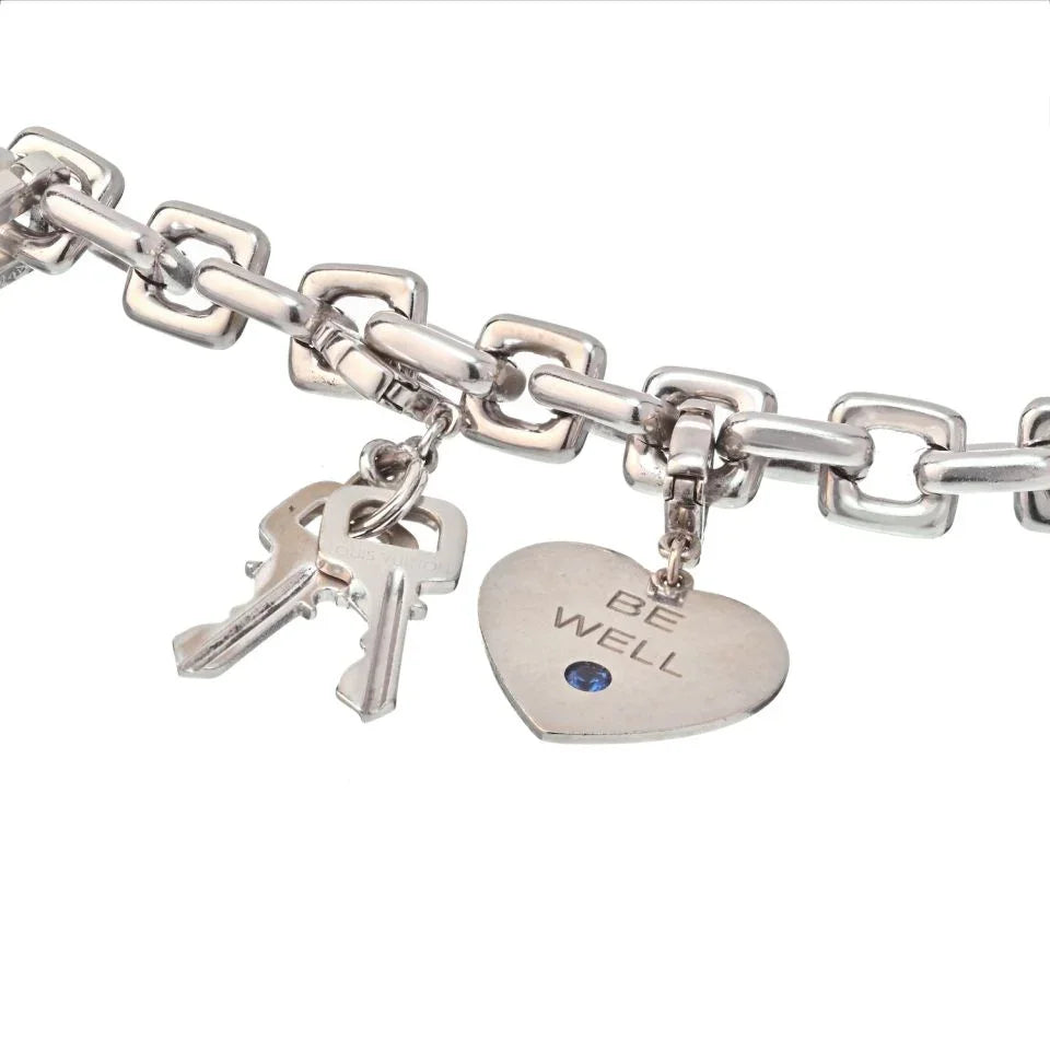 Louis Vuitton 18K White Gold Six Charm Bracelet - The Back Vault