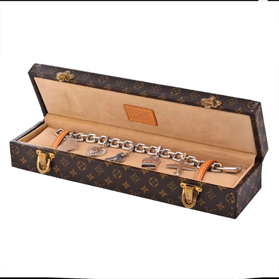Louis Vuitton 18K White Gold Six Charm Bracelet - The Back Vault