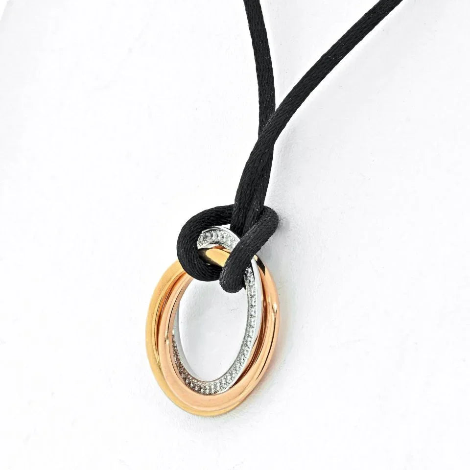 Cartier 18K Tri Color Trinity With Diamonds Pendant On A Black Cord Necklace - The Back Vault