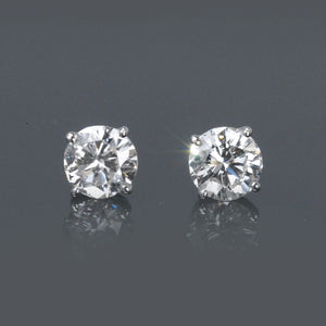 One Pair of Round Diamond Ear Studs 2.00 carat cttw containing 1.00 carat F/VS2 EGLA & 1.00 carat G/SI1 EGLA Set in 14K White Gold