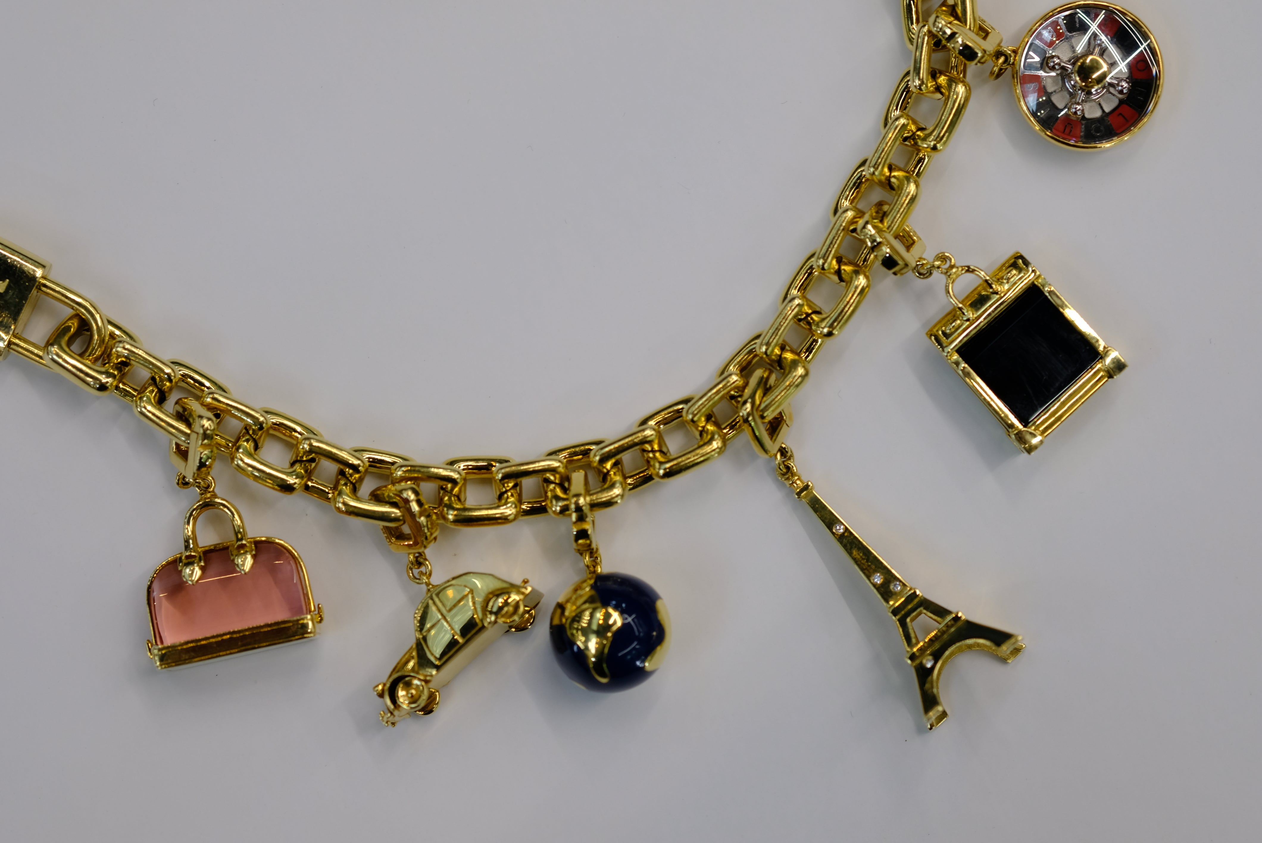 Louis Vuitton 18K Yellow Gold 8 Charm Padlock, Efel Tower, Keys
