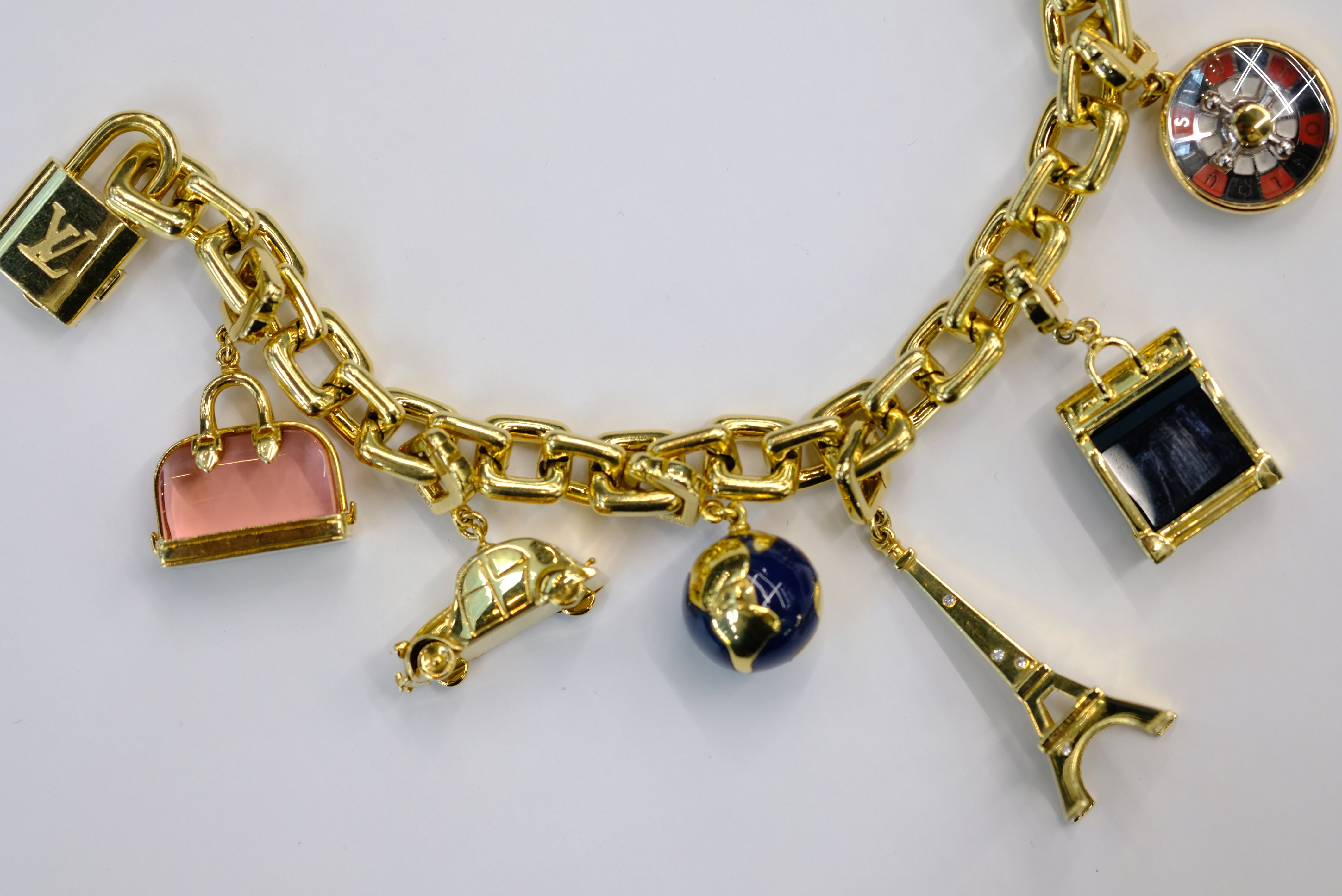 Louis Vuitton 18K Yellow Gold 8 Charm Padlock, Efel Tower, Keys