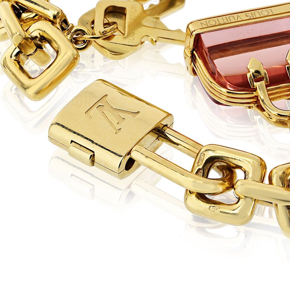 Louis Vuitton 18K Yellow Gold 8 Charm Padlock, Efel Tower, Keys Louis Vuitton 18K Yellow Gold 8 Charm Padlock, Efel Tower, Keys