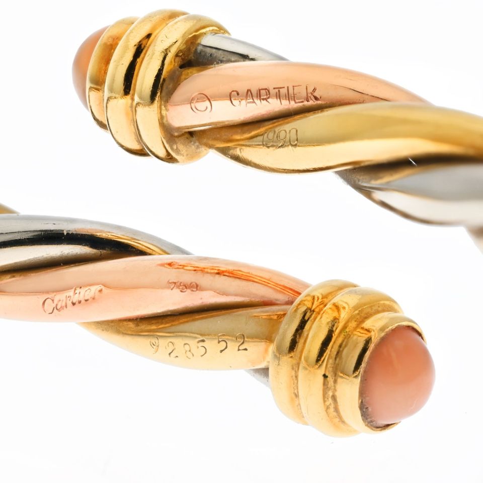 Cartier 18K Yellow Gold Tri-Color Twist Bangle With Coral Tips