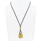 Cartier 18K Yellow Gold Panthere On A Black Cord Pendant