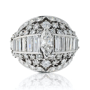 Platinum 1970's Bombe Marquise Cut And Round Cut Diamond Ring