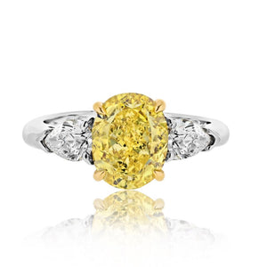 2 carat Oval Diamond GIA 2.53ct Fancy Vivid Yellow Oval Cut Three Stone Ring