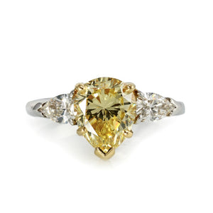 2 carat Pear Shape Diamond Fancy Intense Yellow GIA Three Stone Ring