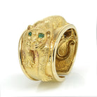 David Webb Repousse L 18K Yellow Gold Panther with Emerald Eyes Cuff Vintage Bracelet - The Back Vault